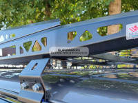 Багажник Уникар для ВАЗ 2121 Нива с боковым ограждением серии ASP на водостоки